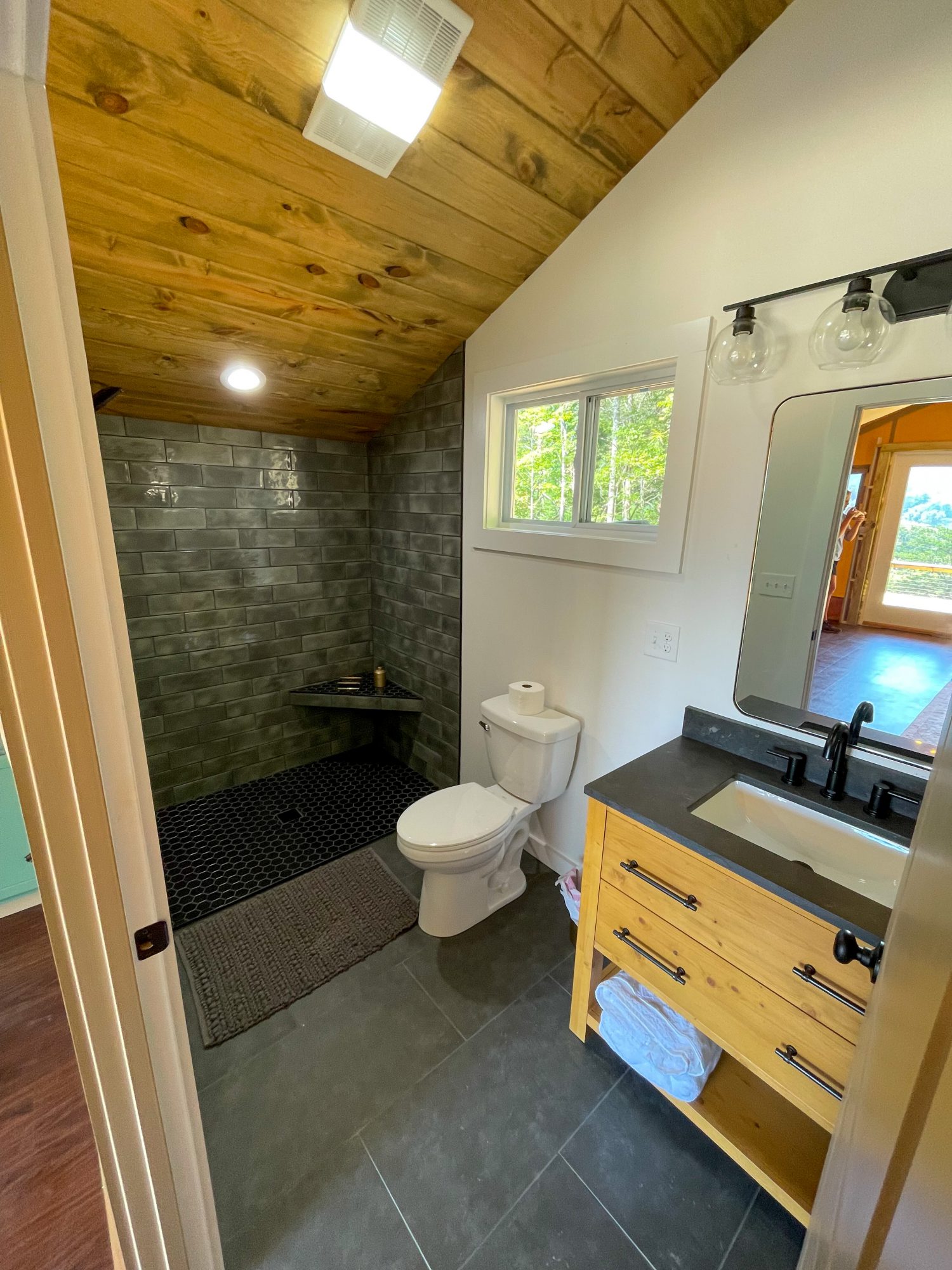 bathroom with heated floors in elevated glamping tent