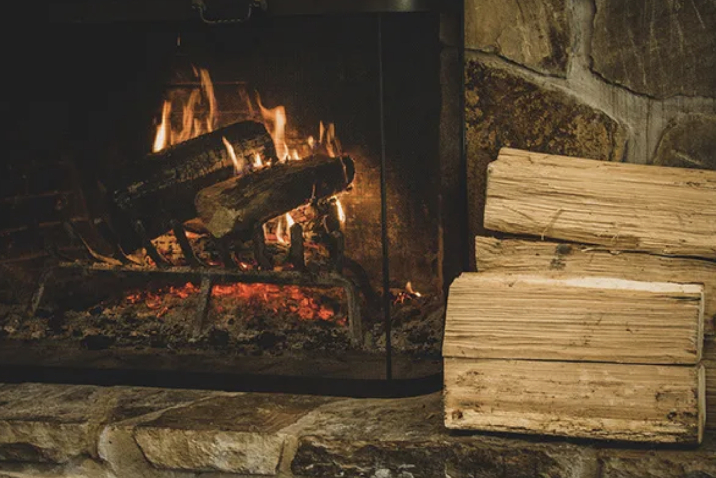 fireplace and stacked wood