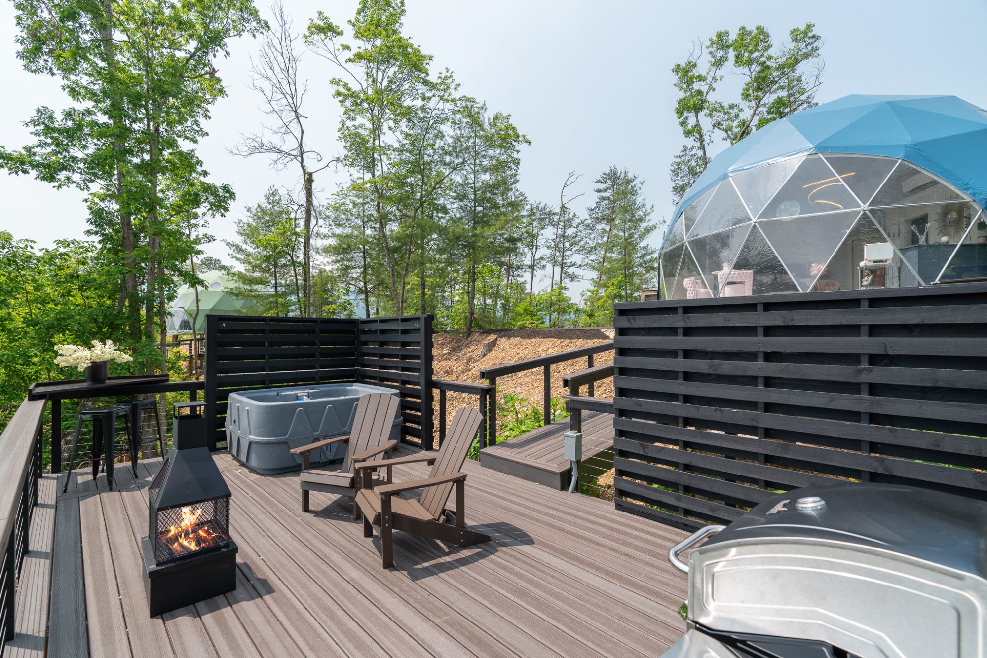 glamping dome deck with hot tub